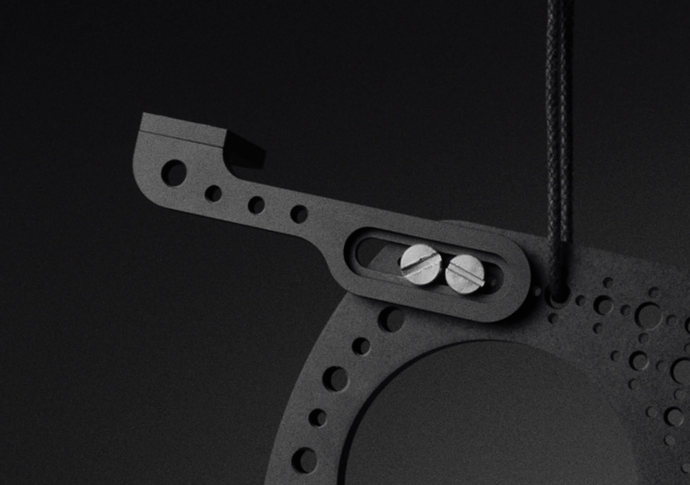 The Video Tap Strap bolted to the side plate through its adjustable slot